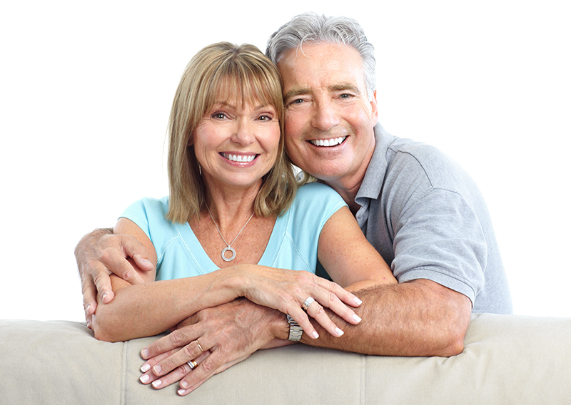 Senior Happy Couple With Dental Implants From Farinacci Dental Care